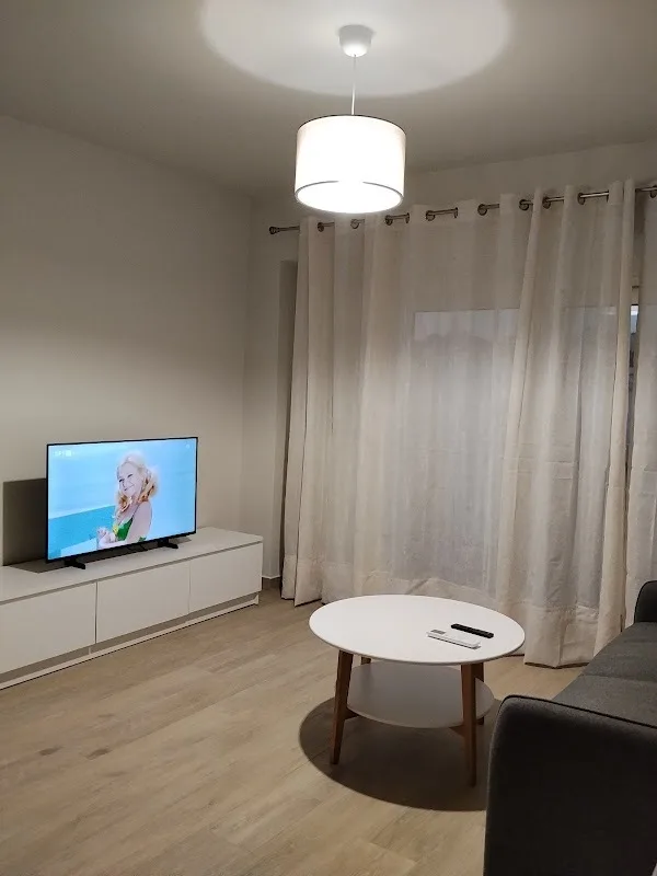 Spacious living room with sofa Queen bed